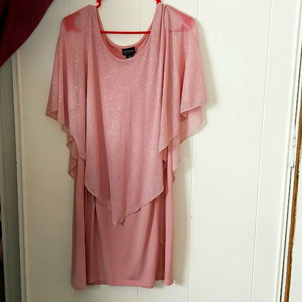 A dusty rose colored pink dress